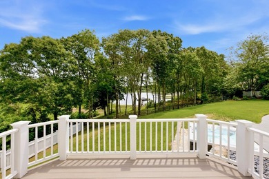 This meticulously renovated waterfront Cape on the bay is - photo 26