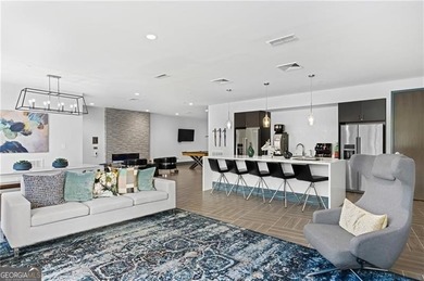 Better than new, this top-floor Midtown residence impresses with