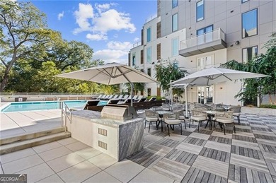 Better than new, this top-floor Midtown residence impresses with