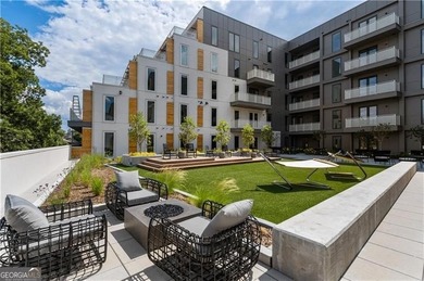 Better than new, this top-floor Midtown residence impresses with