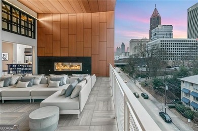 Better than new, this top-floor Midtown residence impresses with
