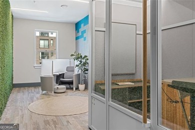 Better than new, this top-floor Midtown residence impresses with