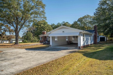 Charming 3 bed/3 bath home on a beautiful 1.09 acre lot. This