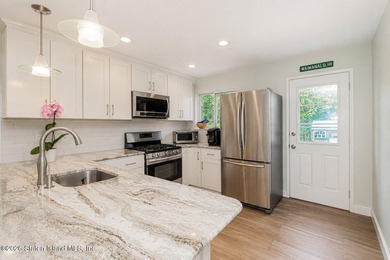 Welcome to 102 Cebra Avenue! This spacious 2-3 bedroom - photo 13