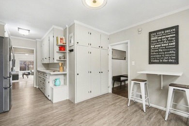 From renowned architect Wallace Frost, these timeless homes are - photo 14