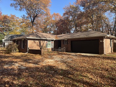 THIS ALL BRICK RANCH HOME is ready for your updates and personal