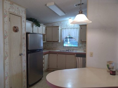 Great location in Whisperwood Manufactured Home Community! Enjoy - photo 3