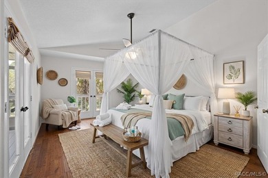 Discover the charm of Old Florida living in this 1994 stilt home - photo 15