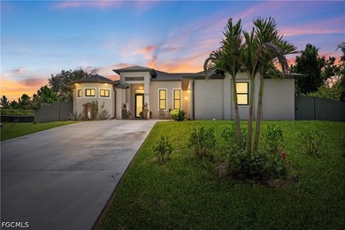 Situated on a spacious half-acre lot in the highly desirable - photo 1