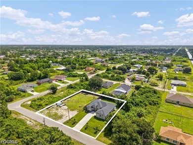 Situated on a spacious half-acre lot in the highly desirable - photo 2