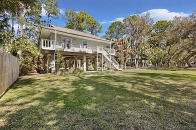 Discover the charm of Old Florida living in this 1994 stilt home - photo 27