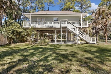 Discover the charm of Old Florida living in this 1994 stilt home - photo 31