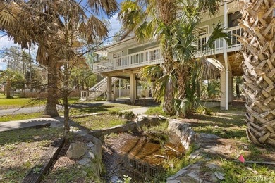 Discover the charm of Old Florida living in this 1994 stilt home - photo 34
