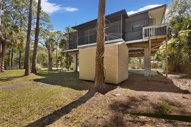 Discover the charm of Old Florida living in this 1994 stilt home - photo 40