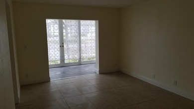 This updated ground floor unit features closed in porch; - photo 6