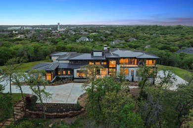 Rising above the forest canopy on nearly 9 secluded acres - photo 2