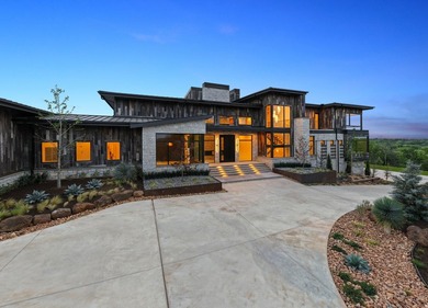 Rising above the forest canopy on nearly 9 secluded acres - photo 3