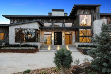 Rising above the forest canopy on nearly 9 secluded acres - photo 4