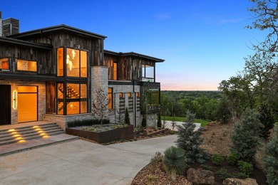 Rising above the forest canopy on nearly 9 secluded acres - photo 5