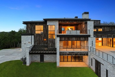 Rising above the forest canopy on nearly 9 secluded acres - photo 6