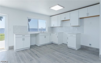 ONCE-IN-A-LIFETIME RIVERFRONT OPPORTUNITY! Experience the - photo 9