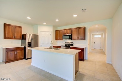 Welcome to this beautifully maintained 4-bedroom, 2-bath home in - photo 2