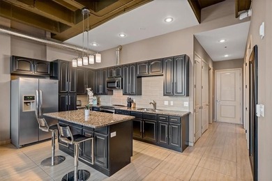 This stunning condo has million dollar views of the city