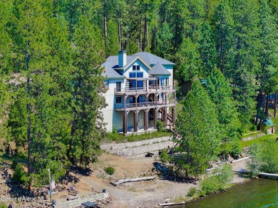Located in Carlin Bay, this custom lakefront home offers 6,074 - photo 12