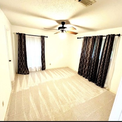 Nestled on a beautifully landscaped corner lot in the - photo 12