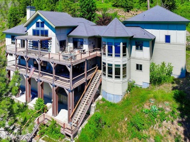 Located in Carlin Bay, this custom lakefront home offers 6,074 - photo 13