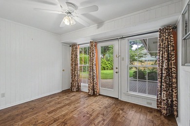 Nestled on a beautifully landscaped corner lot in the - photo 15