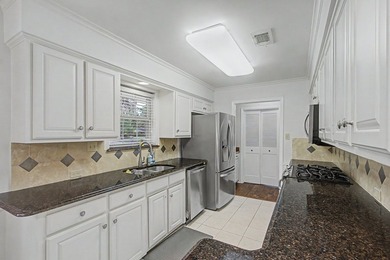 Nestled on a beautifully landscaped corner lot in the - photo 16