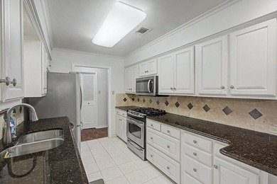 Nestled on a beautifully landscaped corner lot in the - photo 17