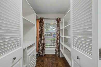 Nestled on a beautifully landscaped corner lot in the - photo 20