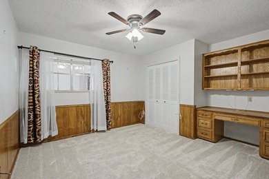 Nestled on a beautifully landscaped corner lot in the - photo 23