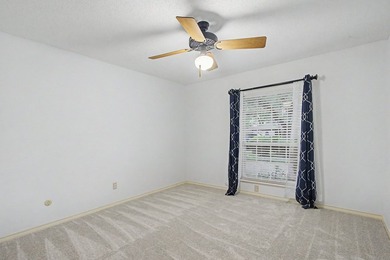 Nestled on a beautifully landscaped corner lot in the - photo 24
