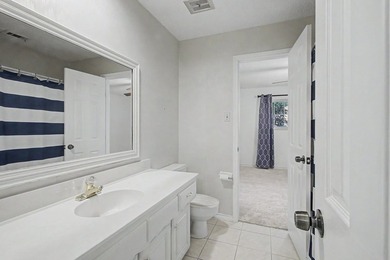 Nestled on a beautifully landscaped corner lot in the - photo 28