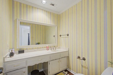 Nestled on a beautifully landscaped corner lot in the - photo 31