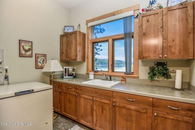Located in Carlin Bay, this custom lakefront home offers 6,074 - photo 35