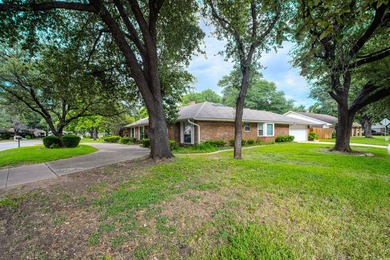 Nestled on a beautifully landscaped corner lot in the - photo 37