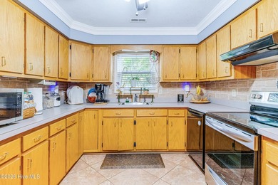 Welcome to this well-maintained 3-bedroom, 2-bath home situated - photo 12