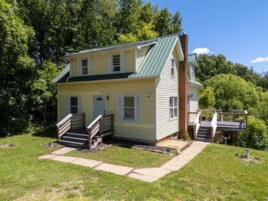 Welcome Home! Charming 4-bedroom, 2-bath home nestled on 1.51 - photo 1