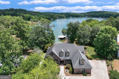 This exceptional, timeless four sided brick, Lake Lanier home - Lake Home For Sale in Gainesville, Georgia