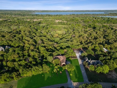 SELLER IS OFFERING $10K SELLER CONCESSIONS! Tucked away in the - photo 1