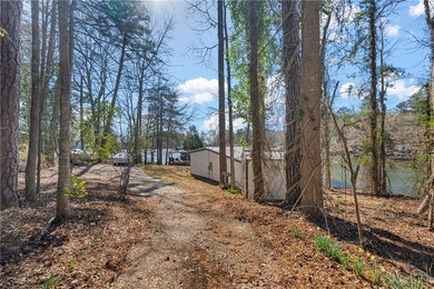 Wake up to breathtaking waterfront views in this stunning home - photo 25