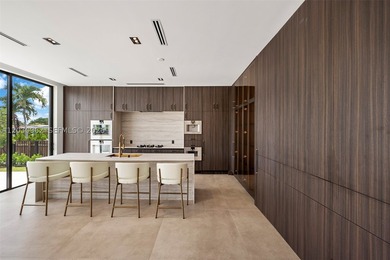 Brand-new waterfront modern estate in the gated Enchanted Lake - photo 9