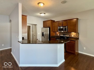 Welcome home to easy, carefree living in Glen Ridge Commons - a