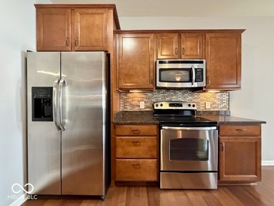 Welcome home to easy, carefree living in Glen Ridge Commons - a