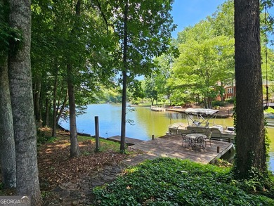 Welcome Home to Lakeside Living at its Finest! Experience the - photo 2