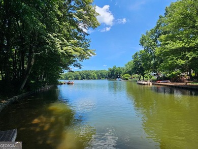 Welcome Home to Lakeside Living at its Finest! Experience the - photo 3